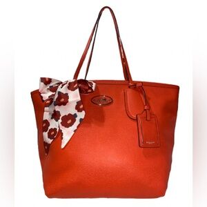 Coach Taxi Tote in coral  great condition, a little wrinkled on the Back. W/ COA